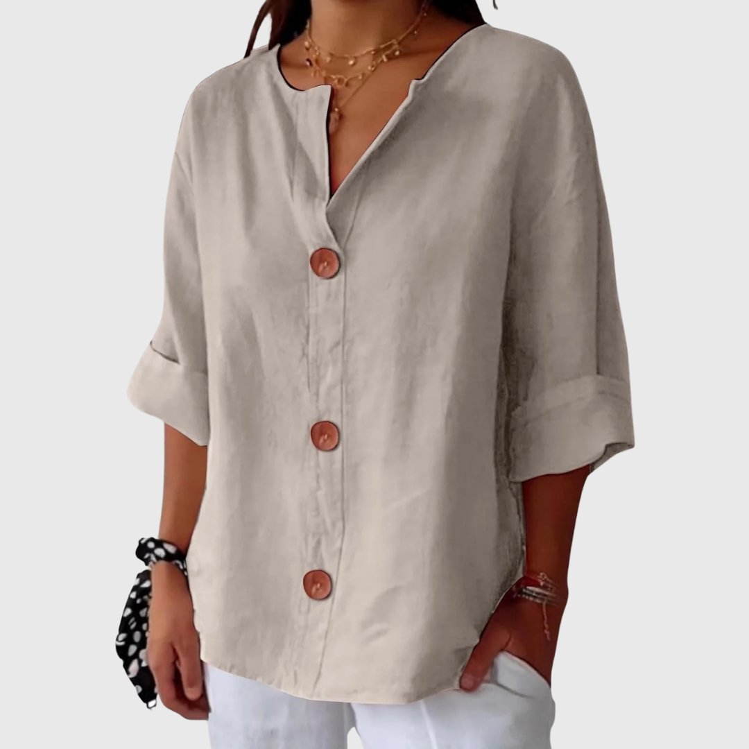 Beige relaxed blouse with V-neck button front, short sleeves, loose silhouette