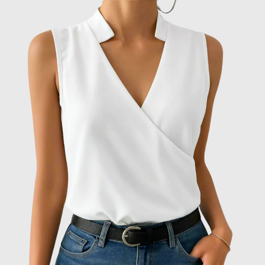 White sleeveless wrap blouse with V-neck and tailored collar