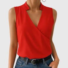 Red sleeveless wrap blouse with V-neck and structured shoulder collar