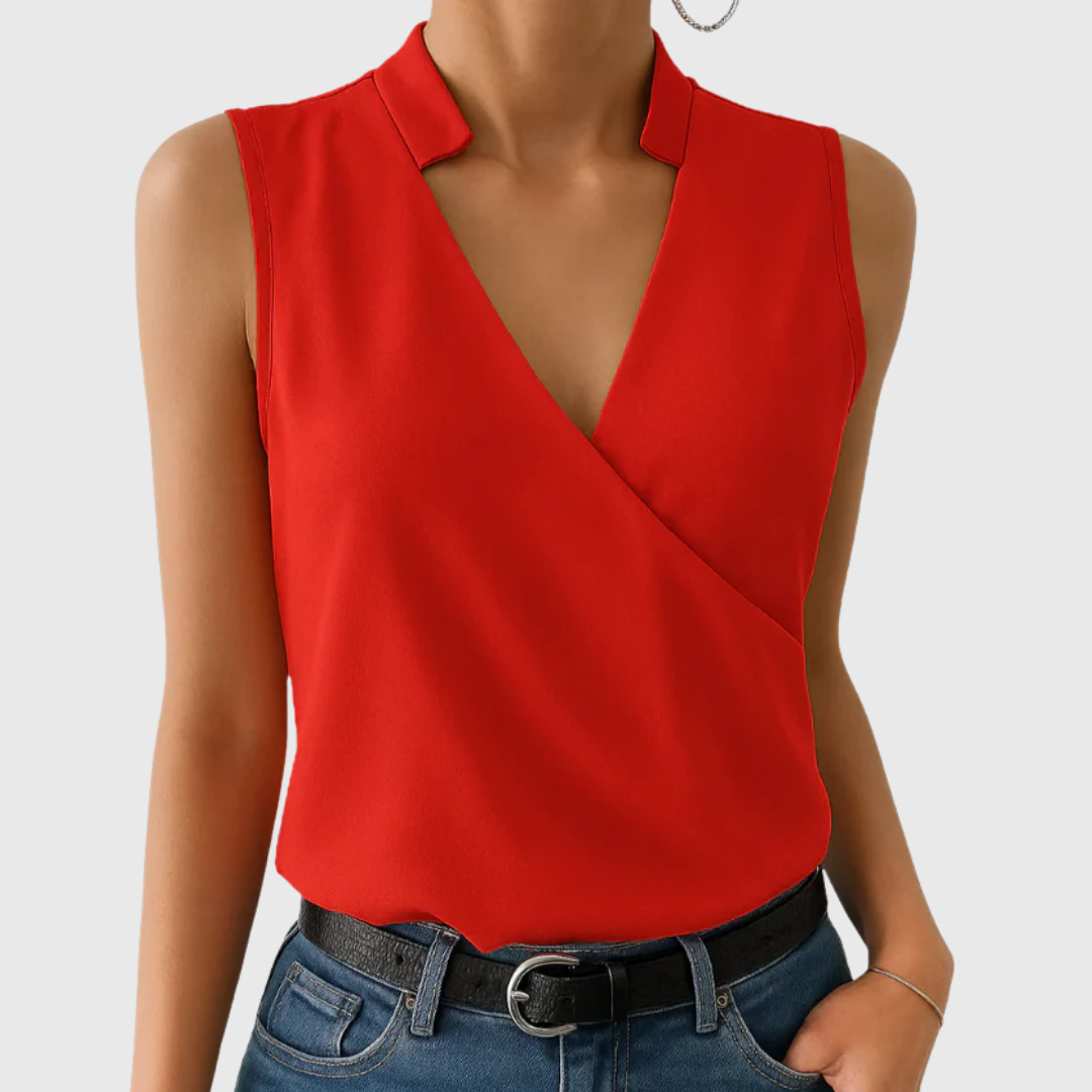 Red sleeveless wrap blouse with V-neck and structured shoulder collar