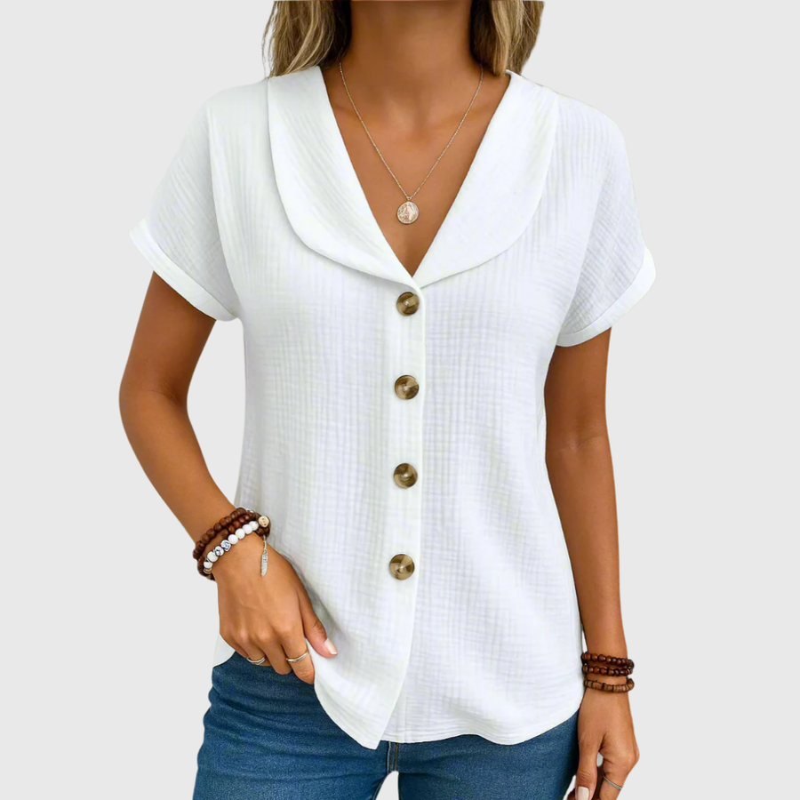 White buttoned blouse with V-neck, short sleeves, and front button placket
