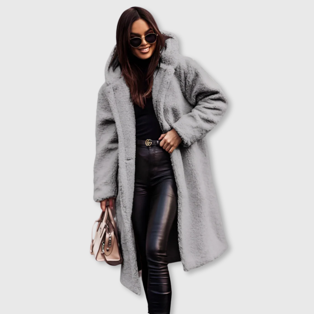 Light gray hooded wool coat, long fuzzy texture with button front and side pockets.