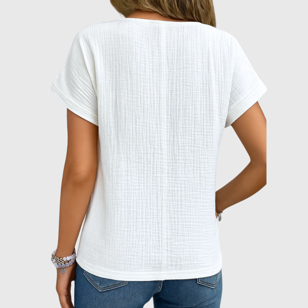 White blouse back view with short sleeves and scooped neckline
