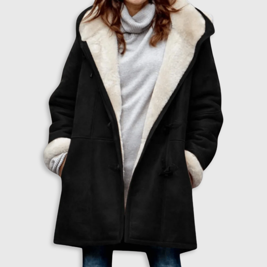 Black shearling coat with light shearling trim, toggle front, long sleeves