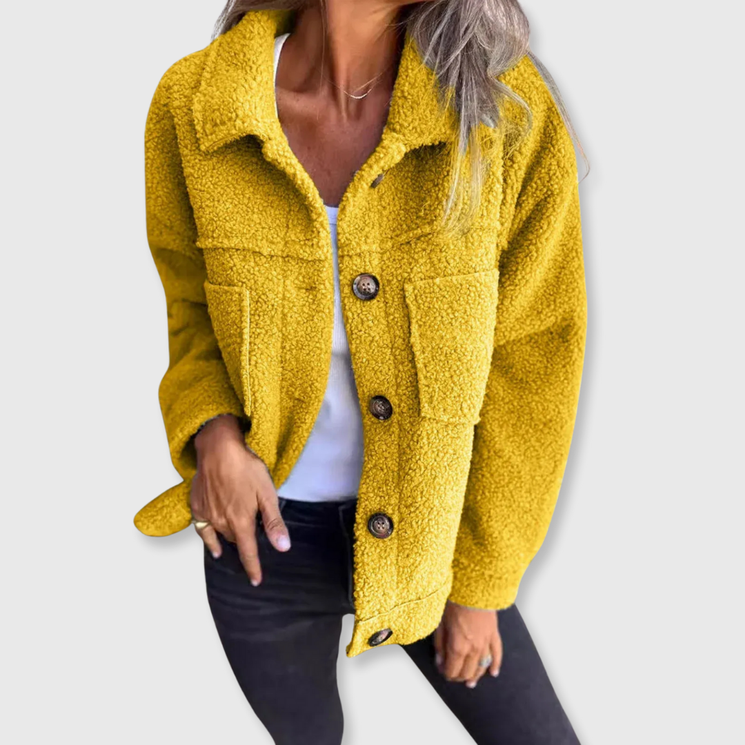 Yellow sherpa-style button-front coat with flap pockets and spread collar.