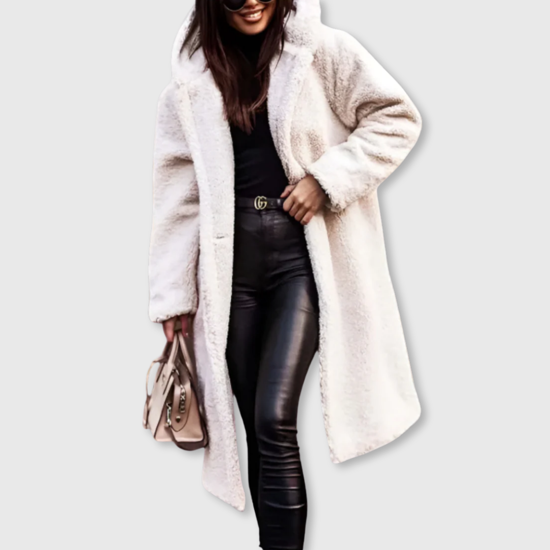 White hooded wool coat, long fuzzy texture with button front and side pockets.