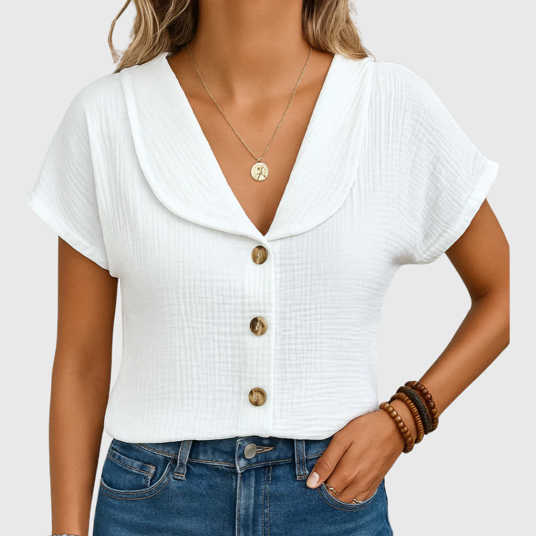White buttoned blouse with V-neck and short sleeves, front button placket