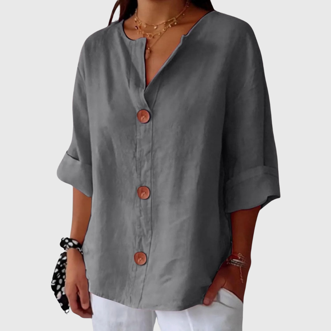 Grey relaxed blouse with V-neck button front and short sleeves, draped fit