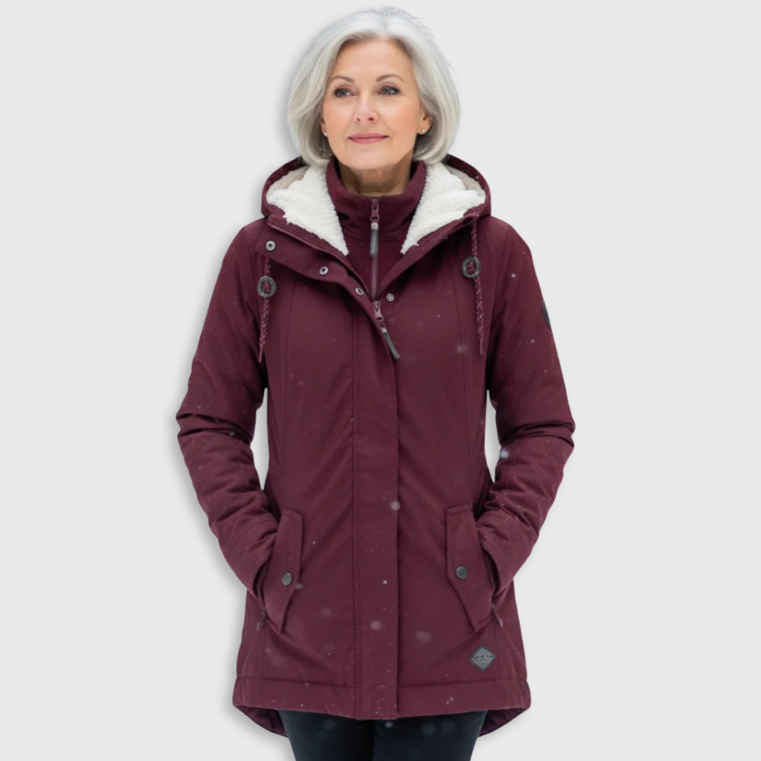 Burgundy sherpa-lined parka with hood, front zip, snap pockets, and drawcord waist