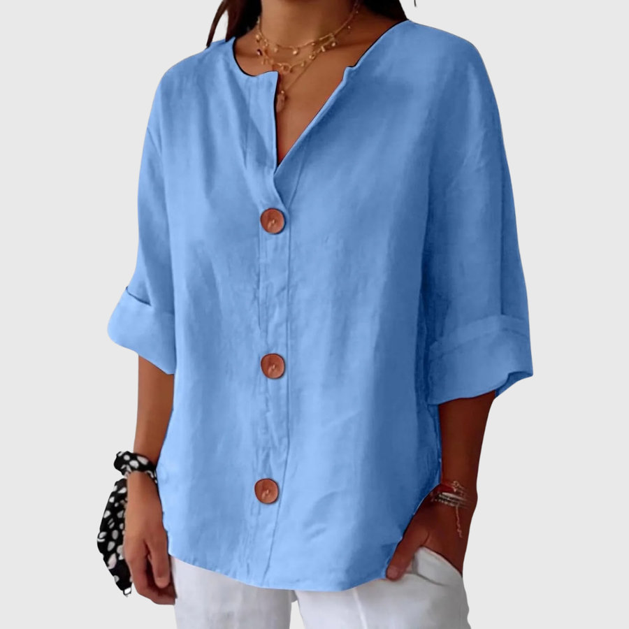 Sky blue relaxed blouse with V-neck button front and short batwing sleeves