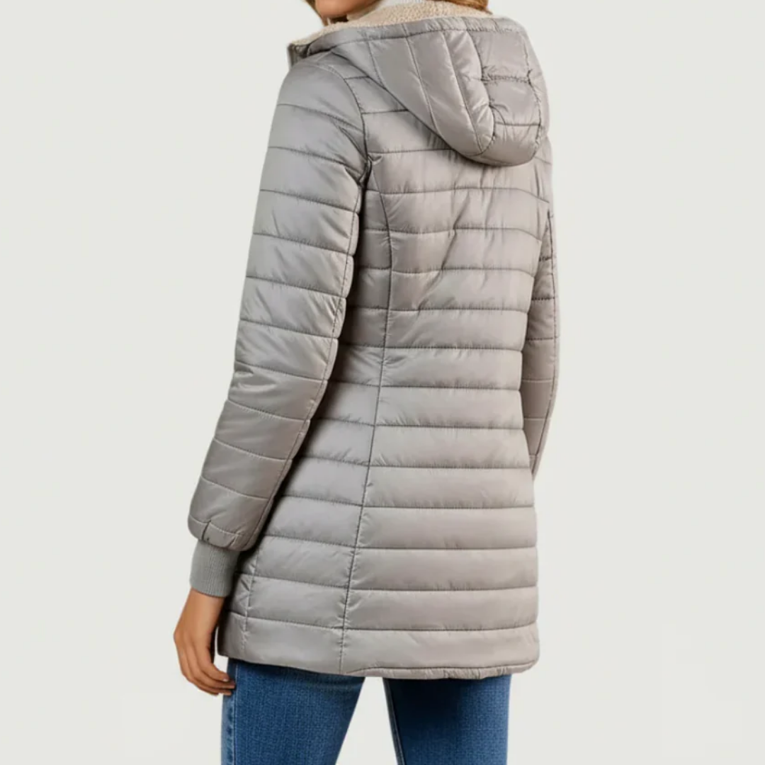 Light gray sherpa-lined winter coat, back view, quilted with hood and zip.