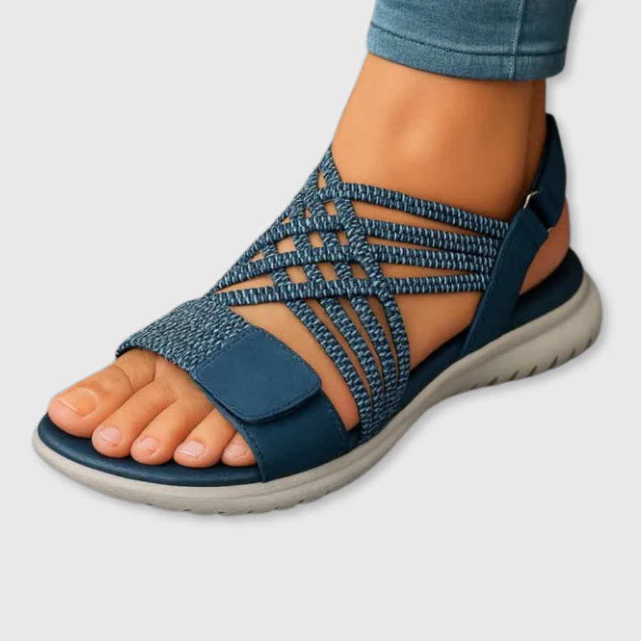 Blue woven strappy sandals with open toe, crisscross upper, and cushioned sole
