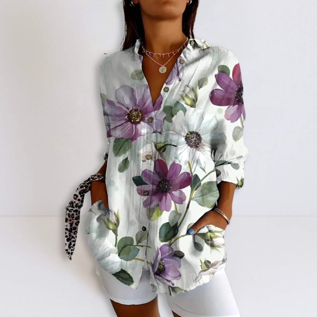 White floral printed button-up relaxed blouse with V-neck and 3/4 sleeves