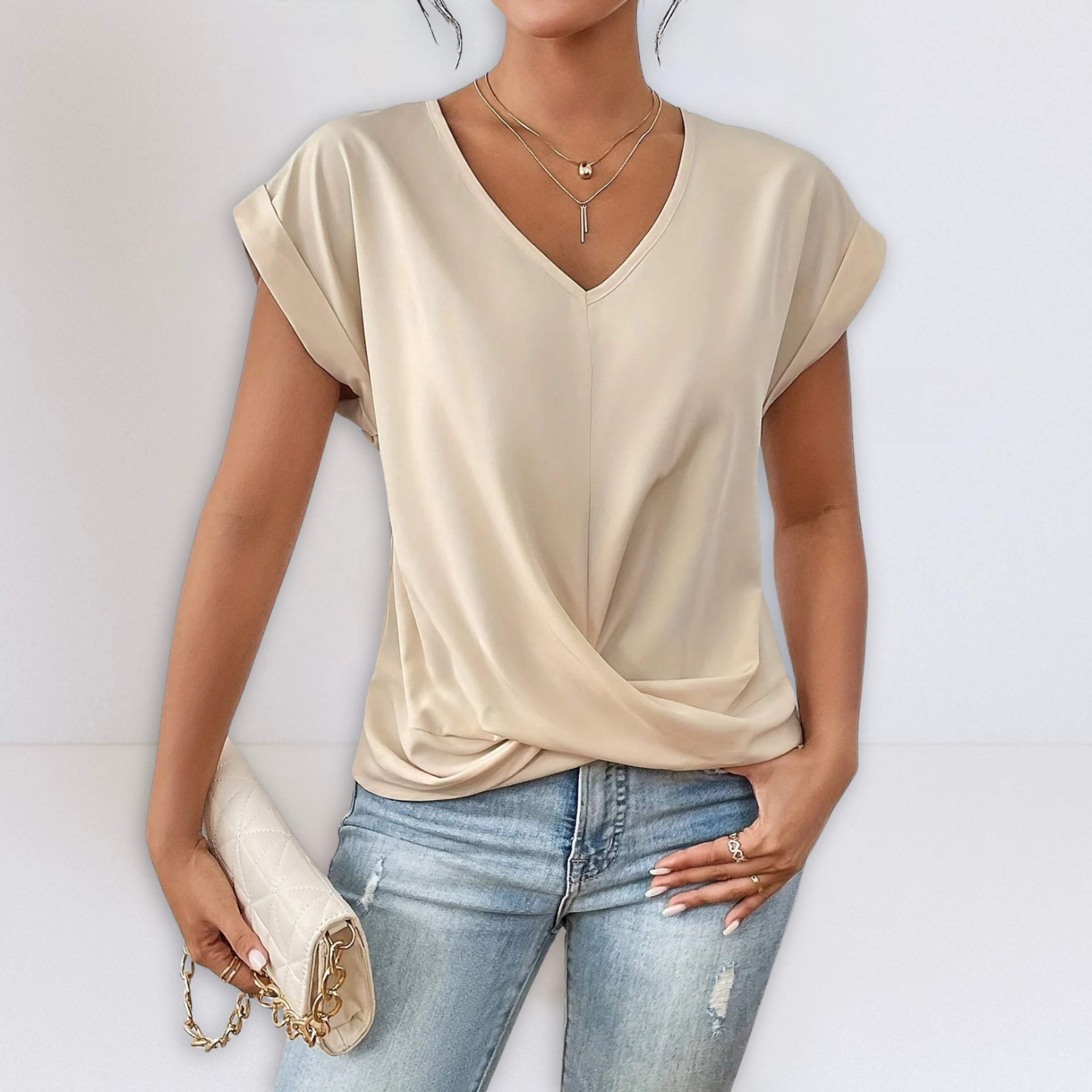 Beige twist-front V-neck top with short sleeves and draped knot detail