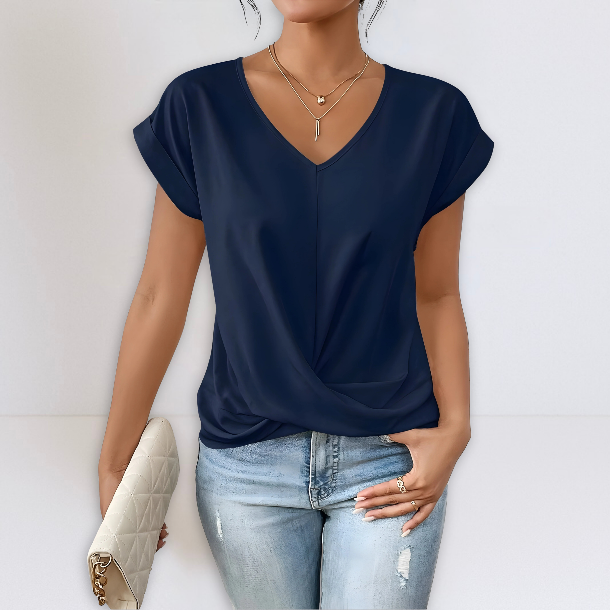 Navy twist-front V-neck top with short sleeves and draped knot detail