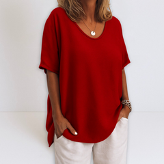 Oversized V-neck blouse in red, short sleeves with relaxed fit and draped sides