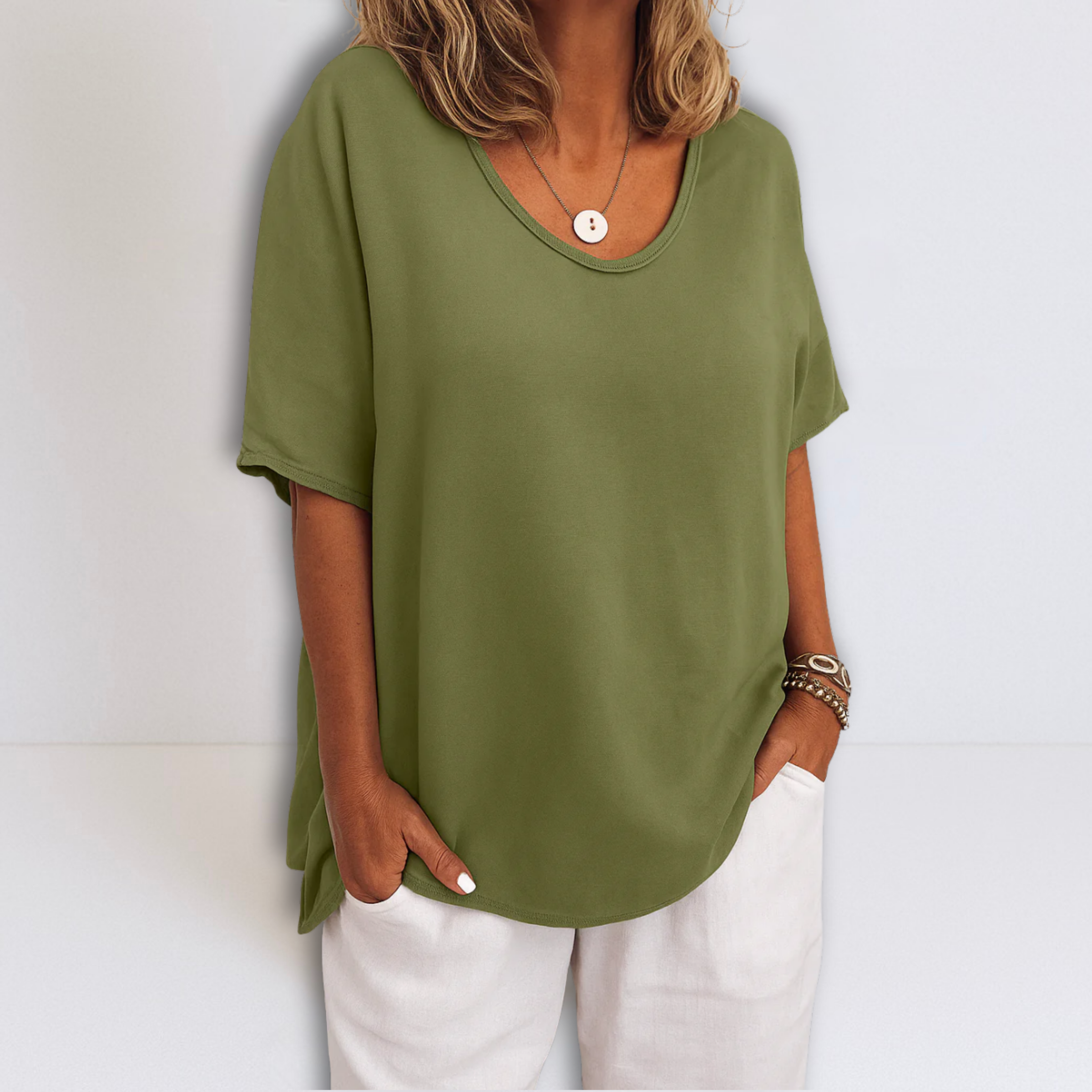 Oversized V-neck blouse in olive green, short sleeves with loose, draped hem
