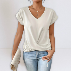 Ivory twist-front V-neck top with short sleeves and draped knot detail