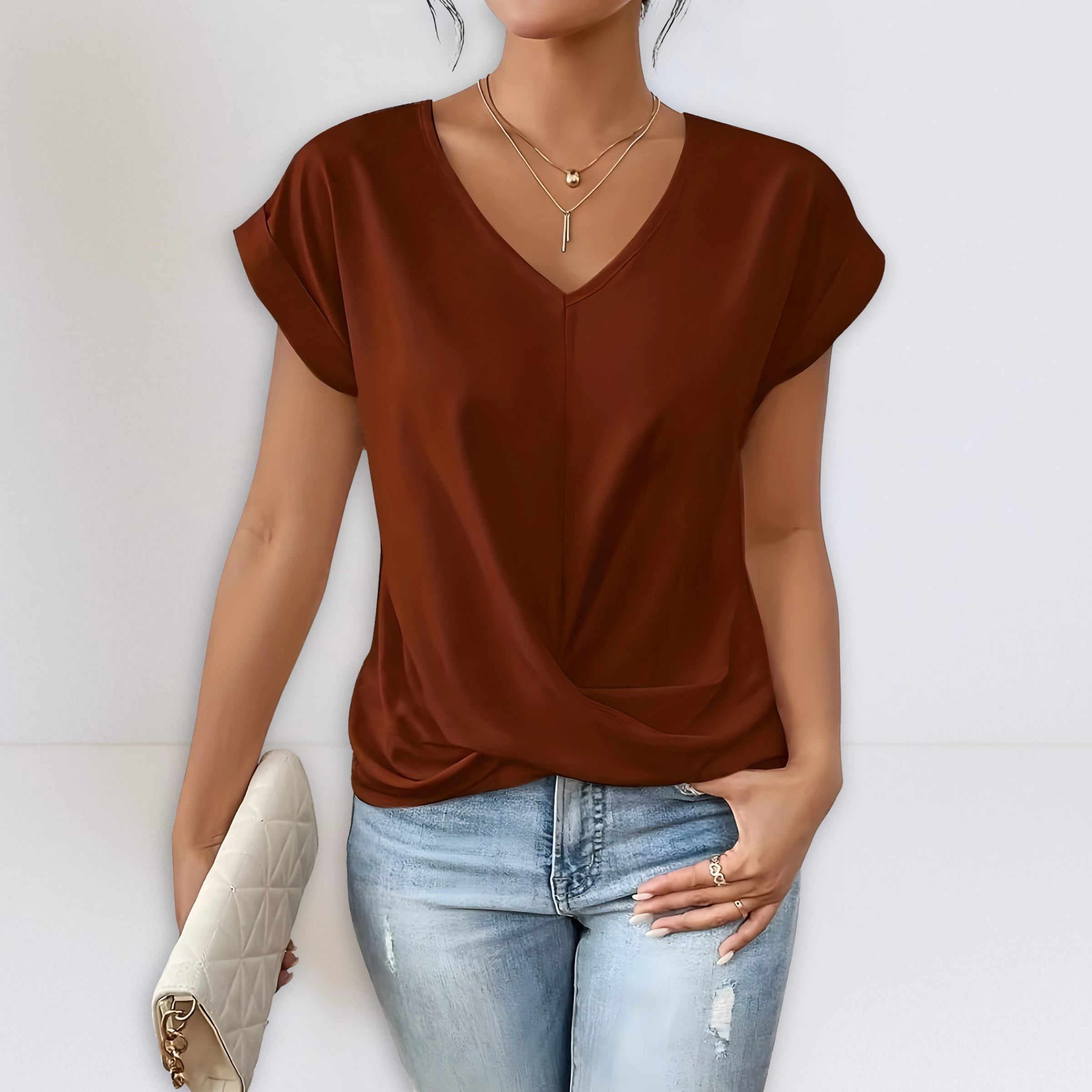 Rust brown twist-front V-neck top with short sleeves and draped knot detail