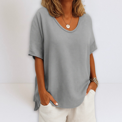 Oversized V-neck blouse in grey, short sleeves with draped hem detail