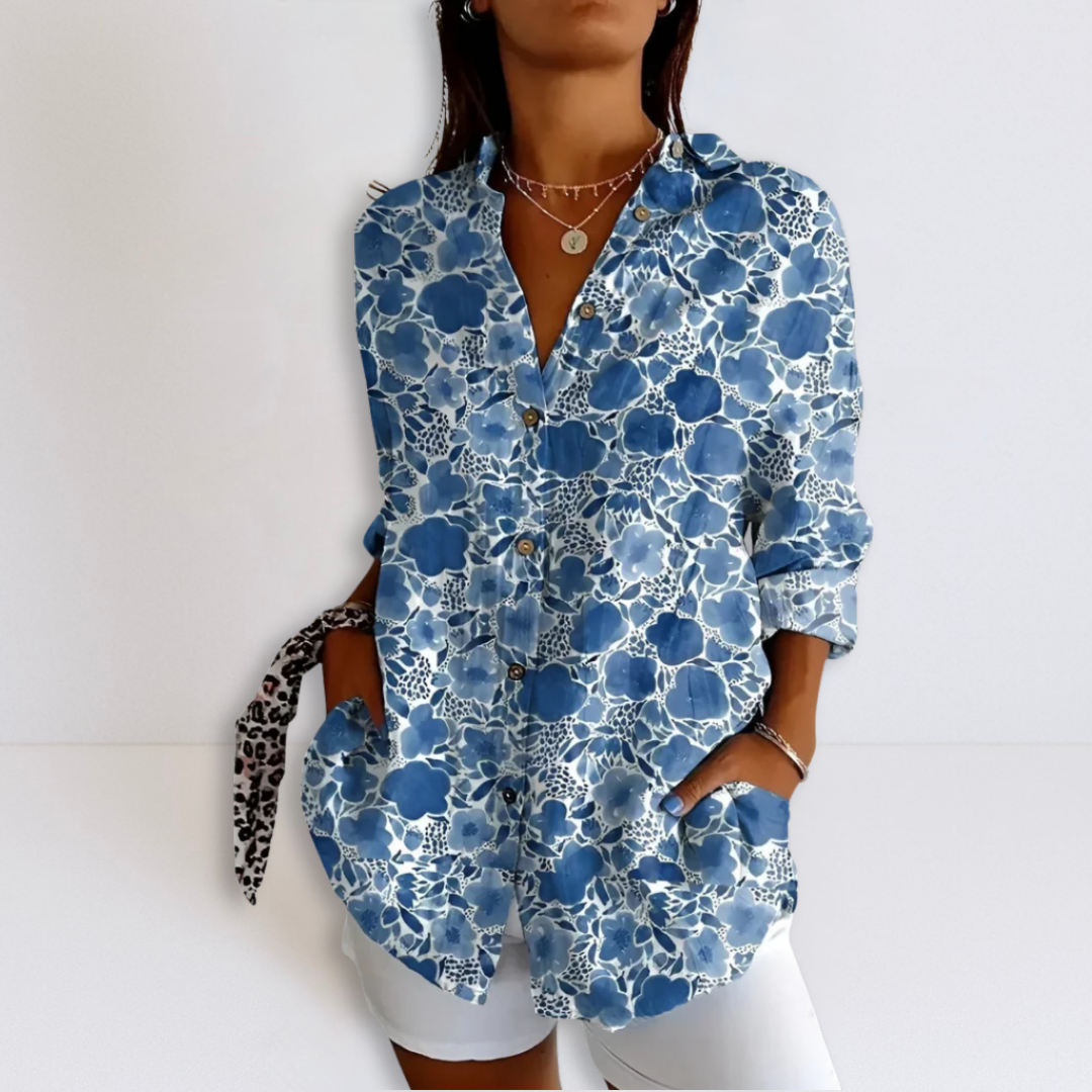 Blue floral printed button-up relaxed blouse with V-neck and 3/4 sleeves