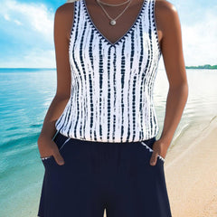 Navy two-piece V-neck swimsuit set with white vertical tie-dye stripe tank and shorts