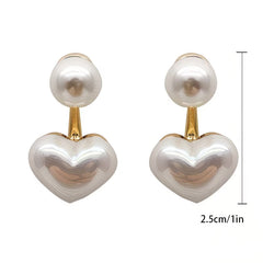White double-pearl heart drop earrings with round top pearls and gold posts