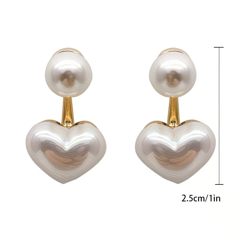 White double-pearl heart drop earrings with round top pearls and gold posts