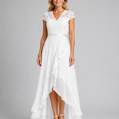 White lace evening dress with cap sleeves and asymmetrical ruffle hem