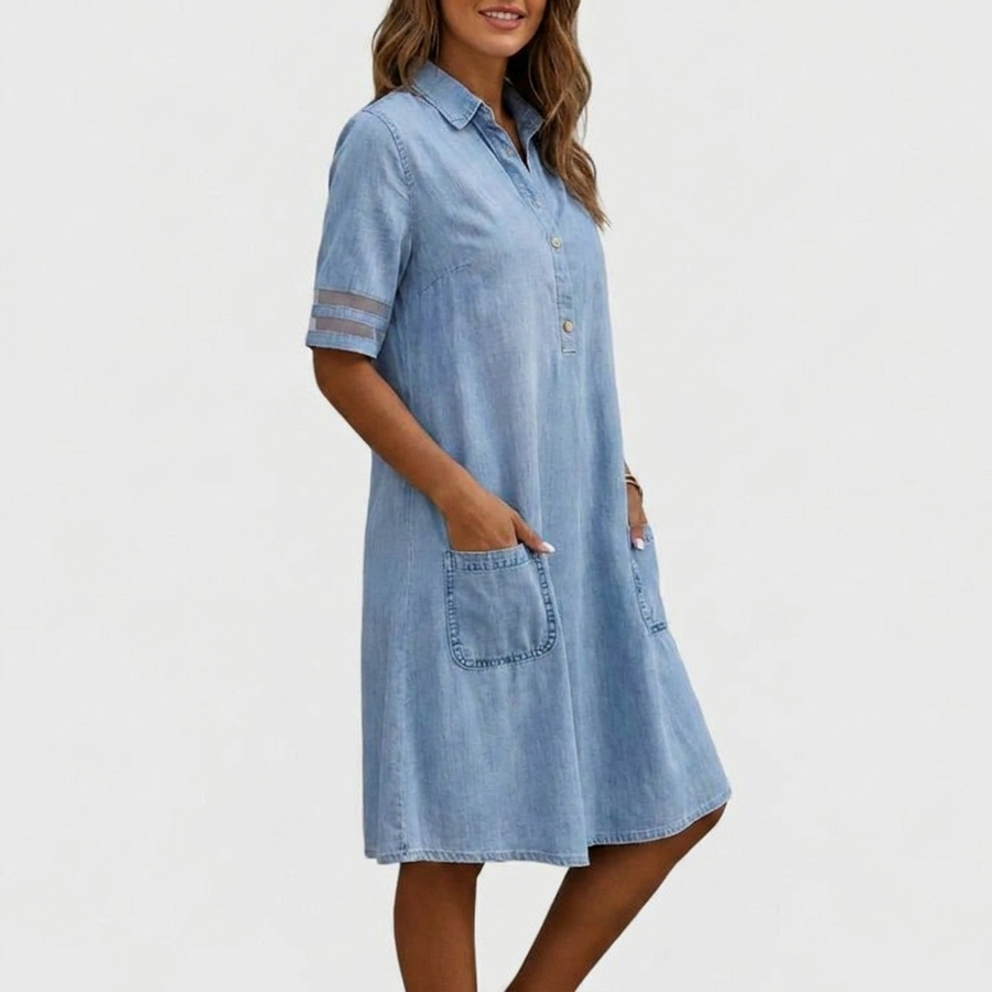 Light blue denim shirt dress, short sleeves with cuff stripes, button placket, and patch pocket