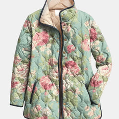 Mint green floral quilted jacket with button front and side pockets
