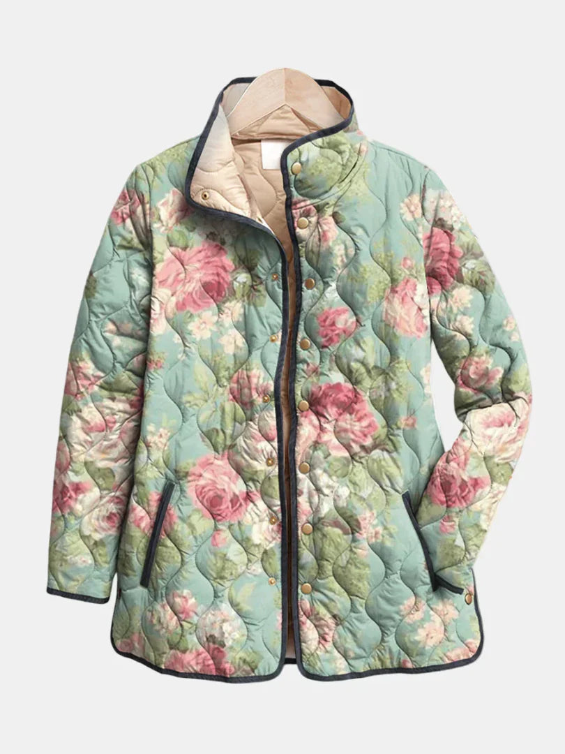 Mint green floral quilted jacket with button front and side pockets