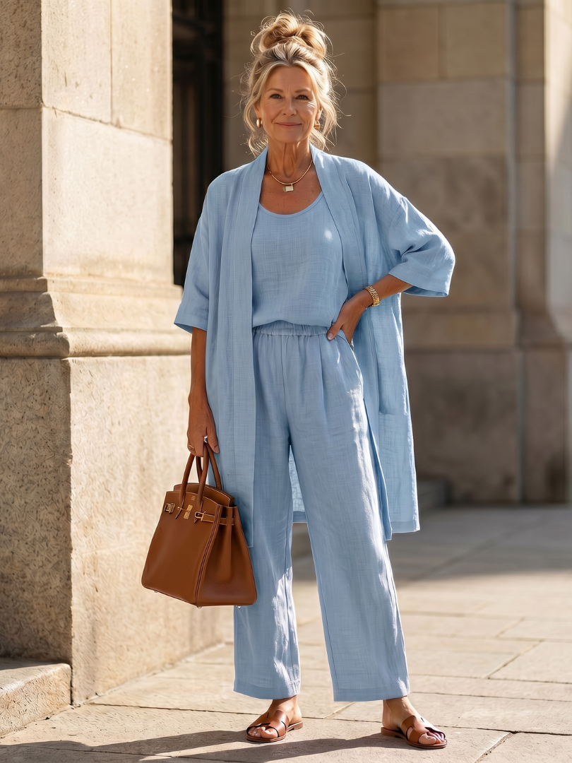 Blue linen-look three-piece set with draped cardigan, scoop-neck top and wide-leg pants