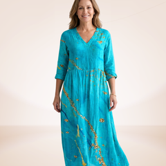 Floral relaxed dress in turquoise with gold floral sprig print, V-neck, 3/4 sleeves, midi hem