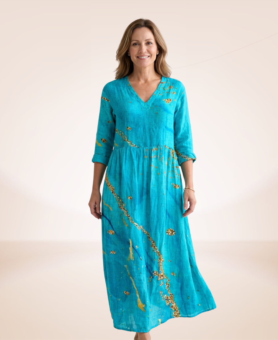 Floral relaxed dress in turquoise with gold floral sprig print, V-neck, 3/4 sleeves, midi hem
