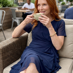 Navy chiffon draped dress with short sleeves and layered ruffle hem