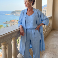 Light blue relaxed three-piece set with scoop-neck top, elastic waist pants, duster