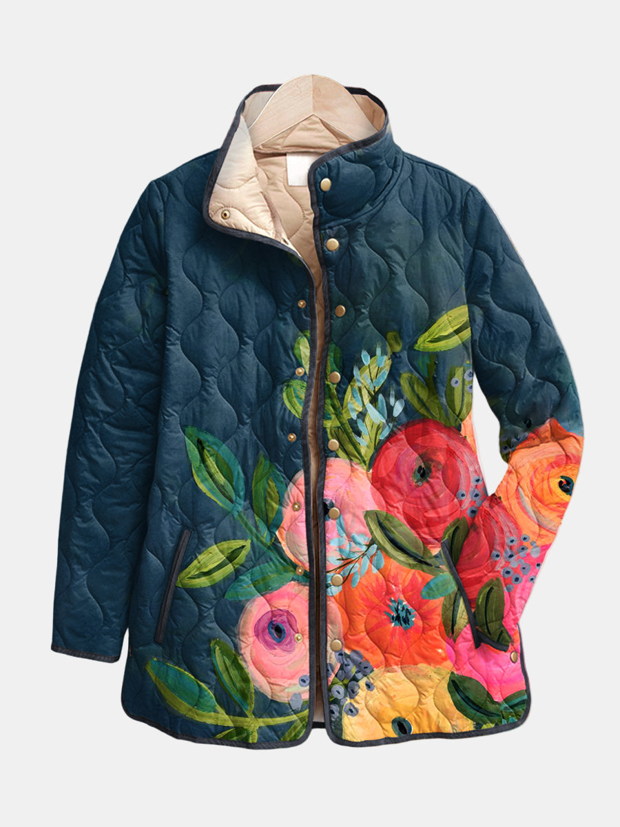 Quilted floral print jacket, navy base with button-up front and cream lining at collar