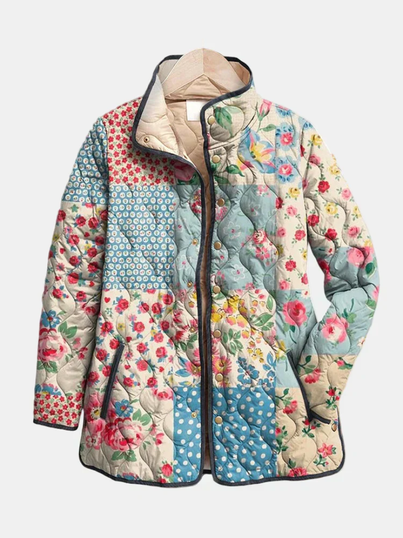 Multicolour floral quilted jacket close-up with front zipper and padded lining