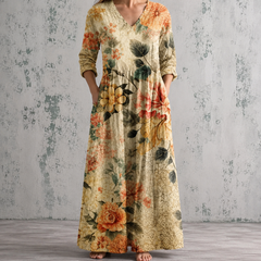 Floral summer dress with V-neck, 3/4 sleeves, and gathered waist detail