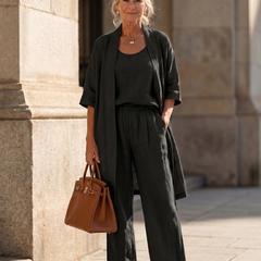 Black relaxed three-piece set with open duster and wide-leg pants