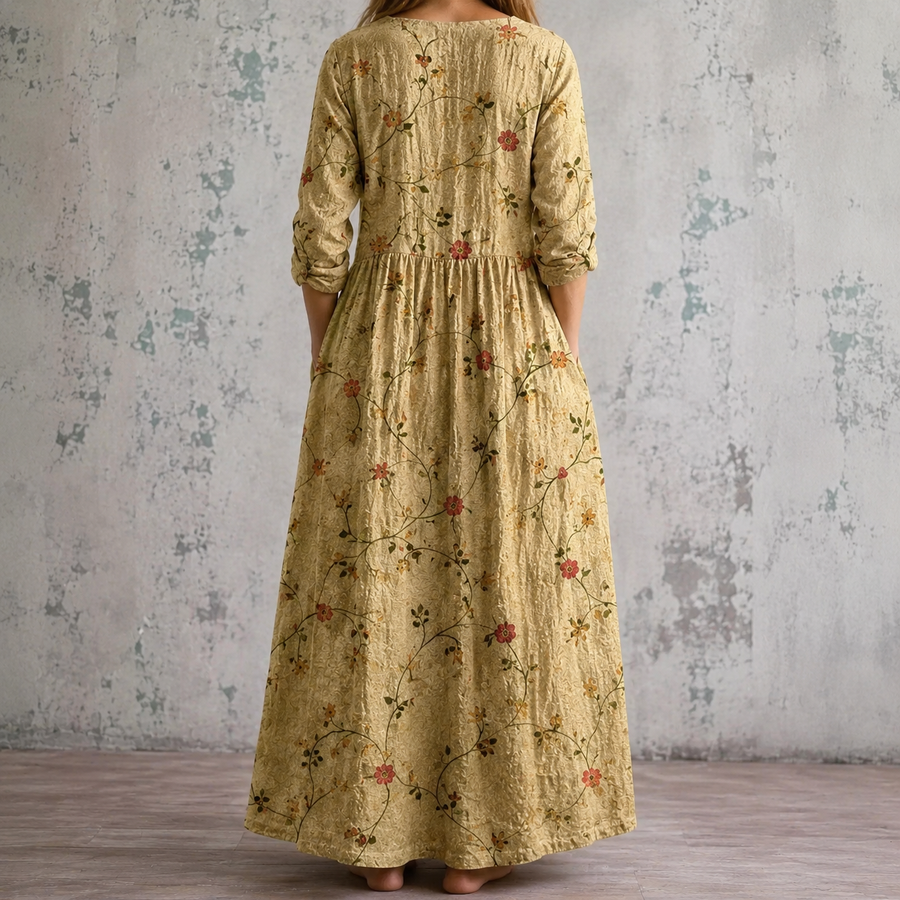 Floral summer dress back view in light olive with red flowers, 3/4 sleeves, gathered waist