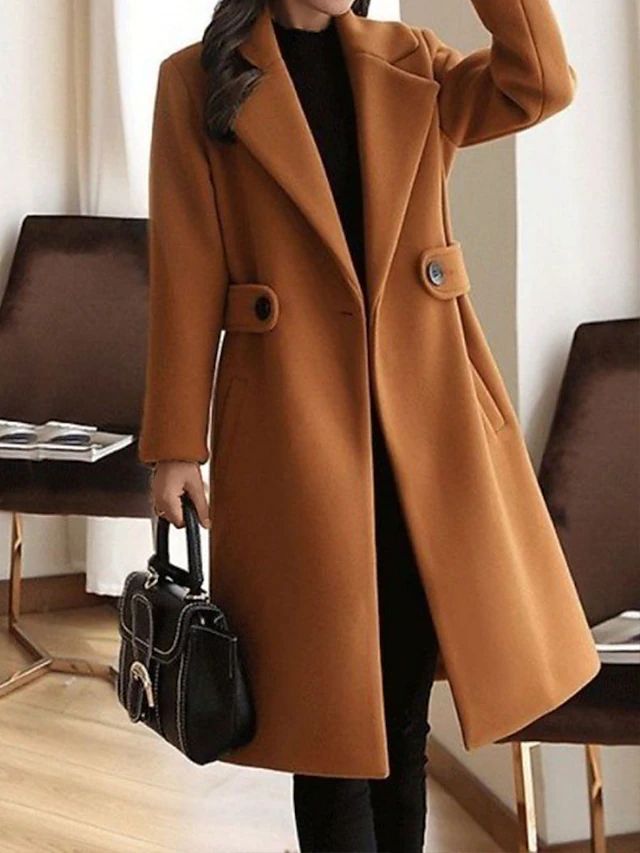 Brown overcoat with notched lapels, front buttons, and belt at the waist