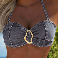 Dark grey denim-style bandeau bikini top with center oval metal buckle and thin straps