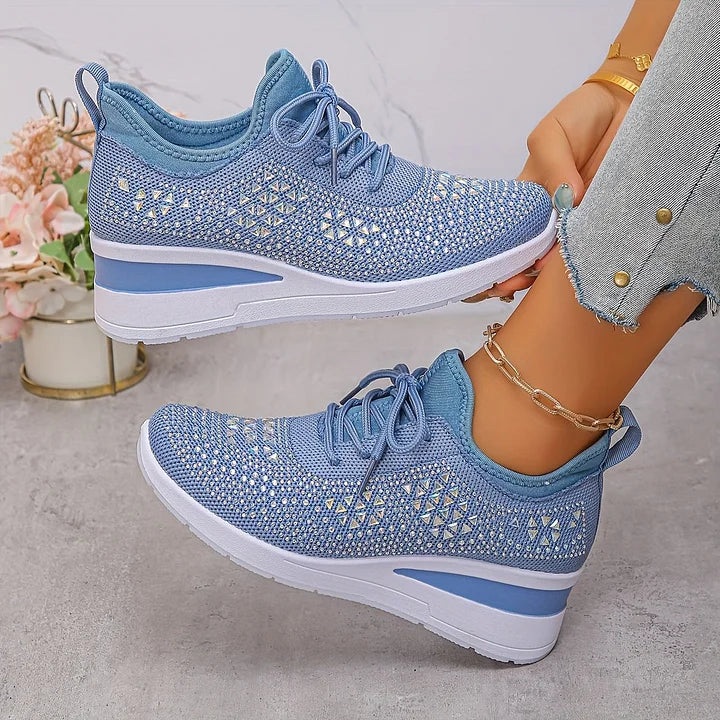 Blue comfort sneakers, lace-up knit upper with white sole and cushioned platform