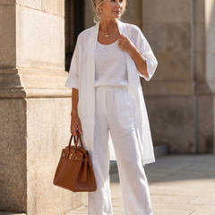 White relaxed three-piece set with open duster and wide-leg pants