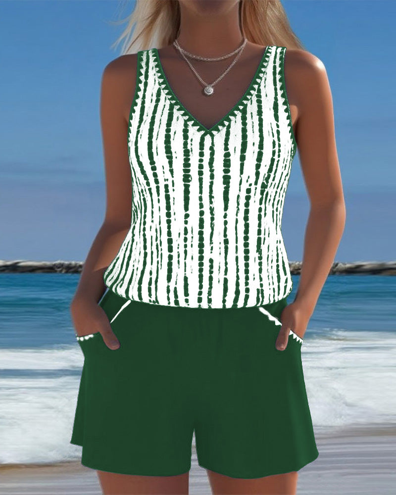 Green two-piece V-neck swimsuit set with white vertical tie-dye stripe top and shorts