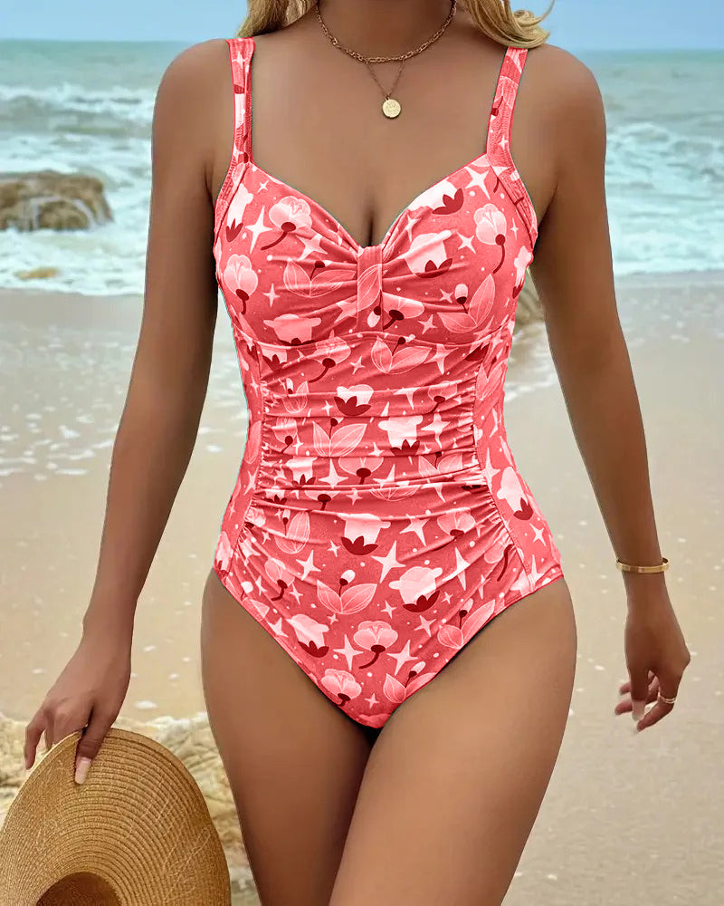Red printed one-piece tankini swimsuit with ruched front and bow-tie at bust