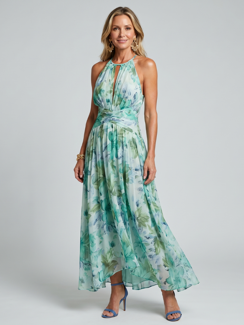 Green halter midi dress with soft floral print, pleated skirt and gathered waist
