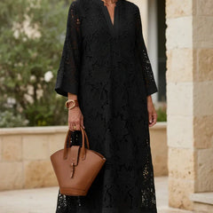 Onyx black lace midi dress with V-neck, three-quarter sleeves, and textured lace design
